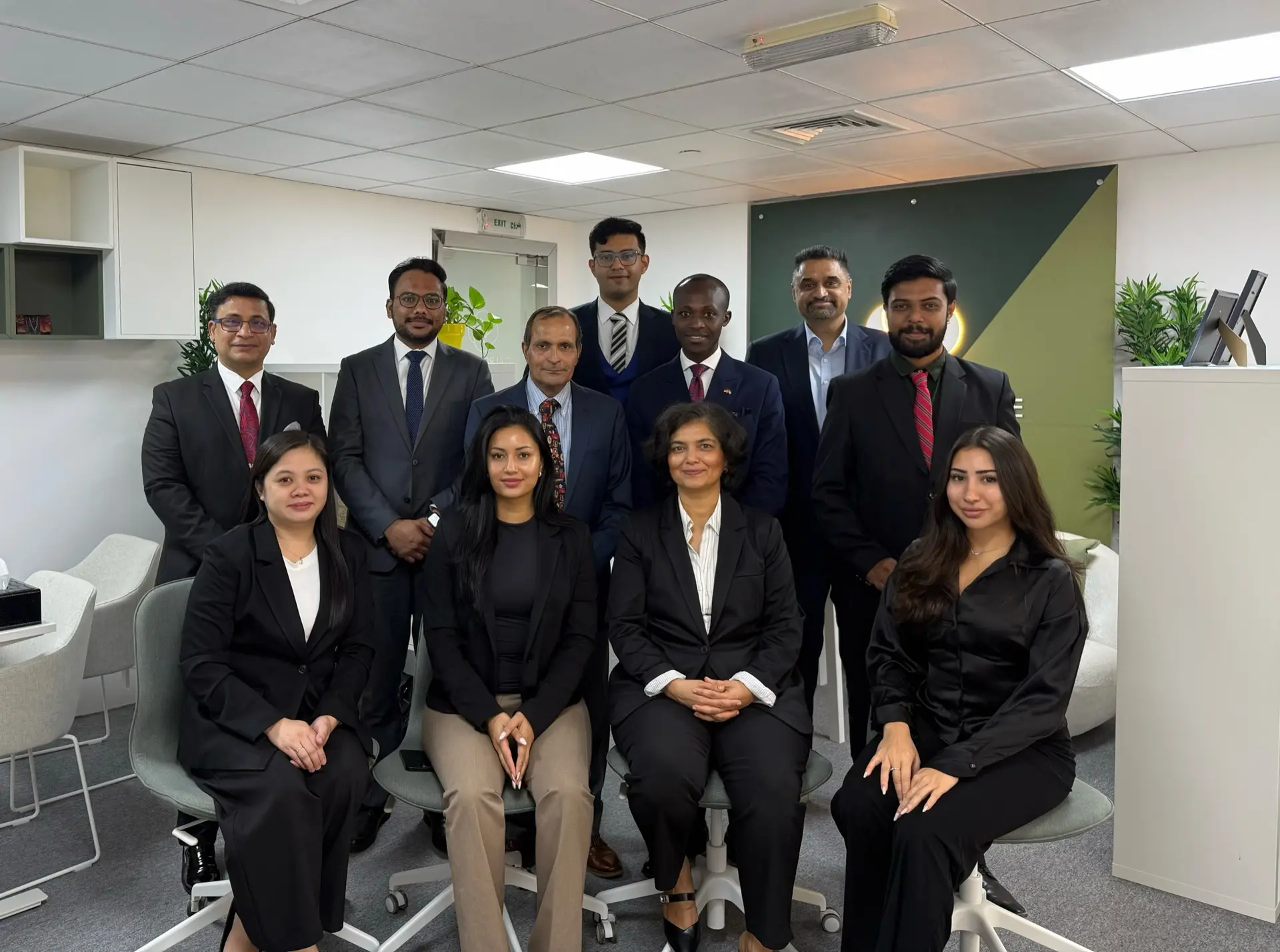 The Ikigai Real Estate team together in their Dubai office