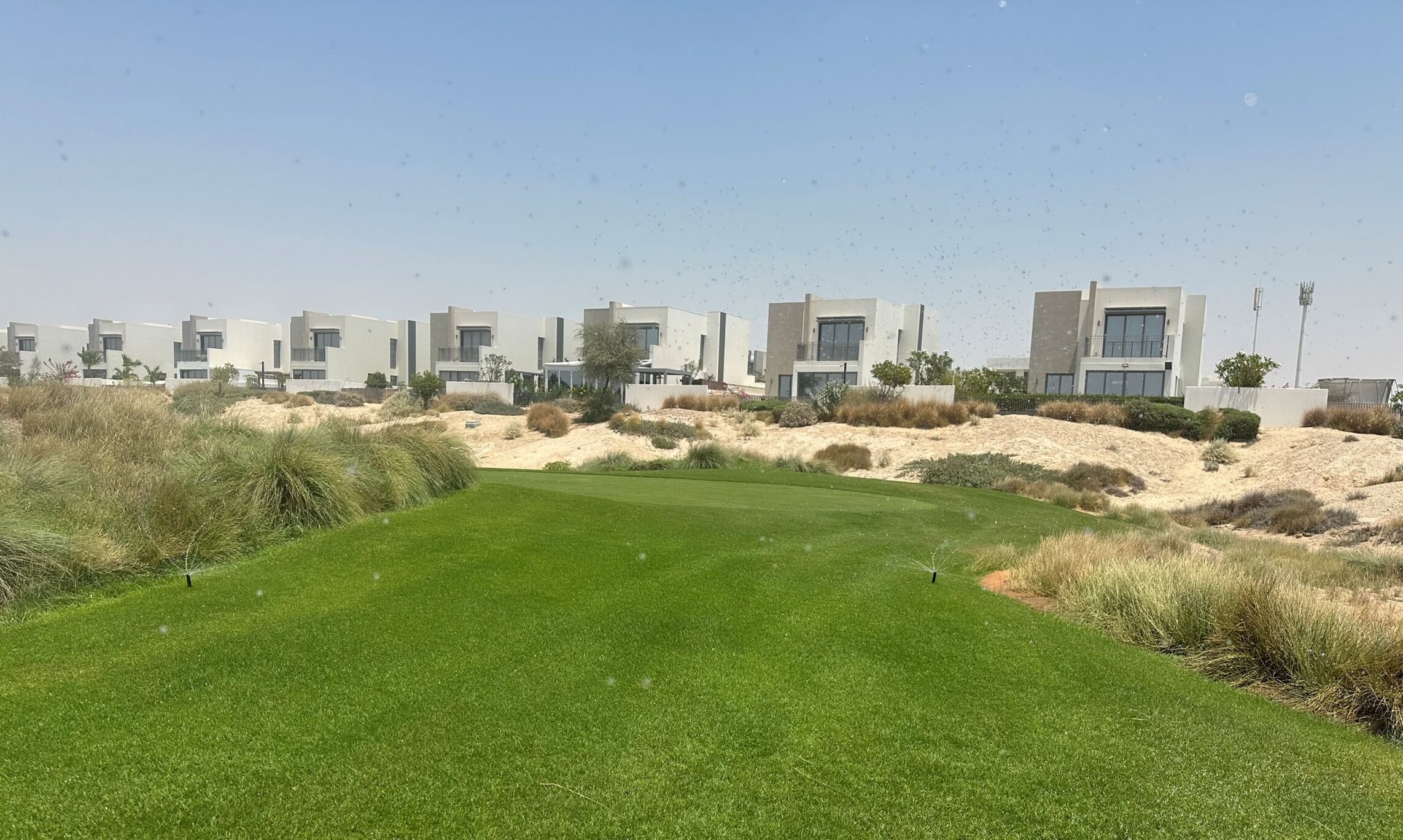 Fairway of the championship golf course and Expo Golf Villas in Emaar South, Dubai South, UAE