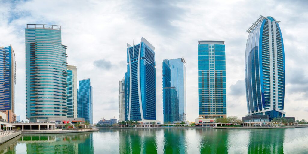 Canal promenade and modern high-rise residential towers at Jumeirah Lake Towers, Dubai