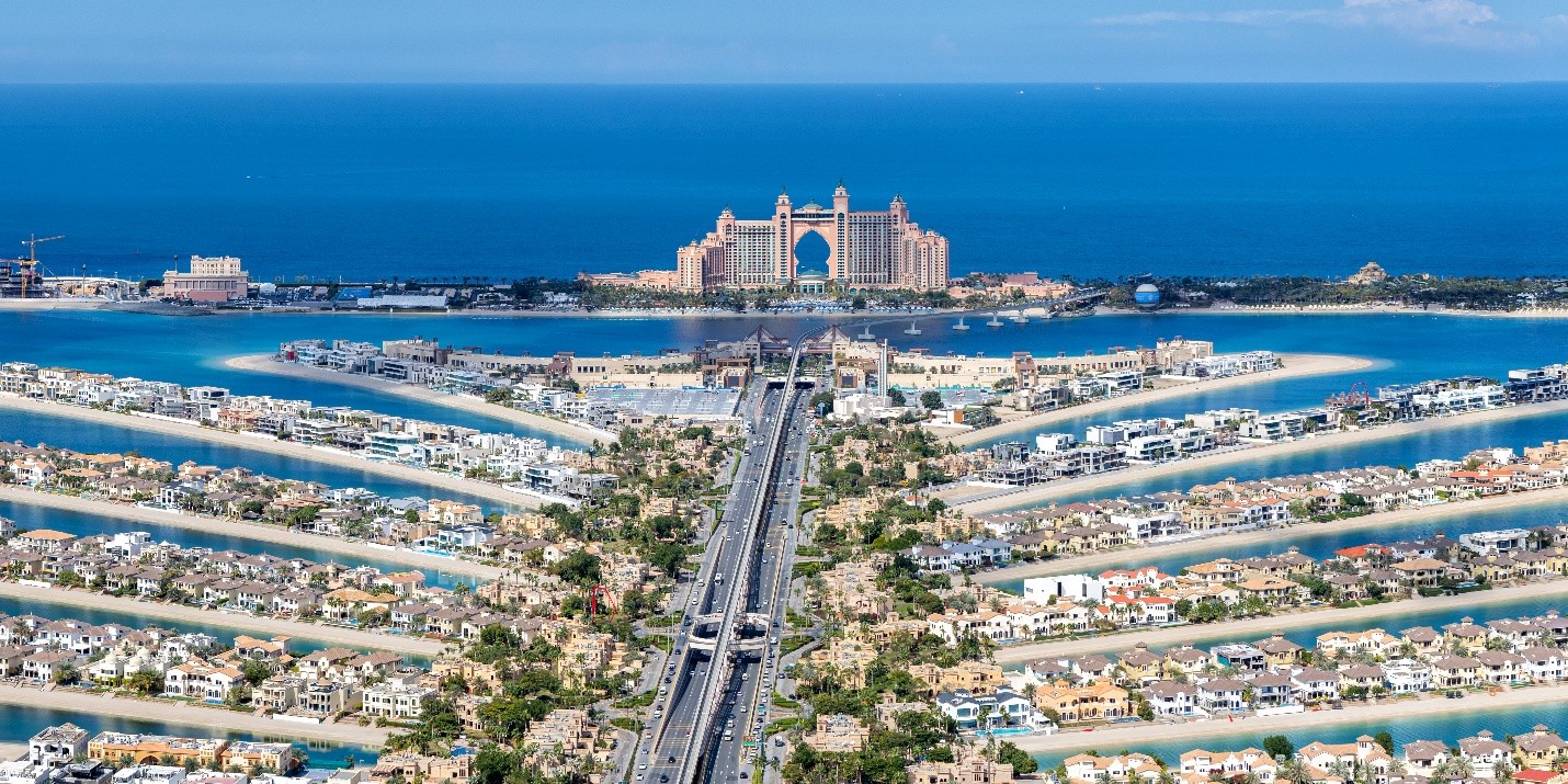 Aerial view of The Palm Jumeirah’s trunk and residential fronds in Dubai, UAE