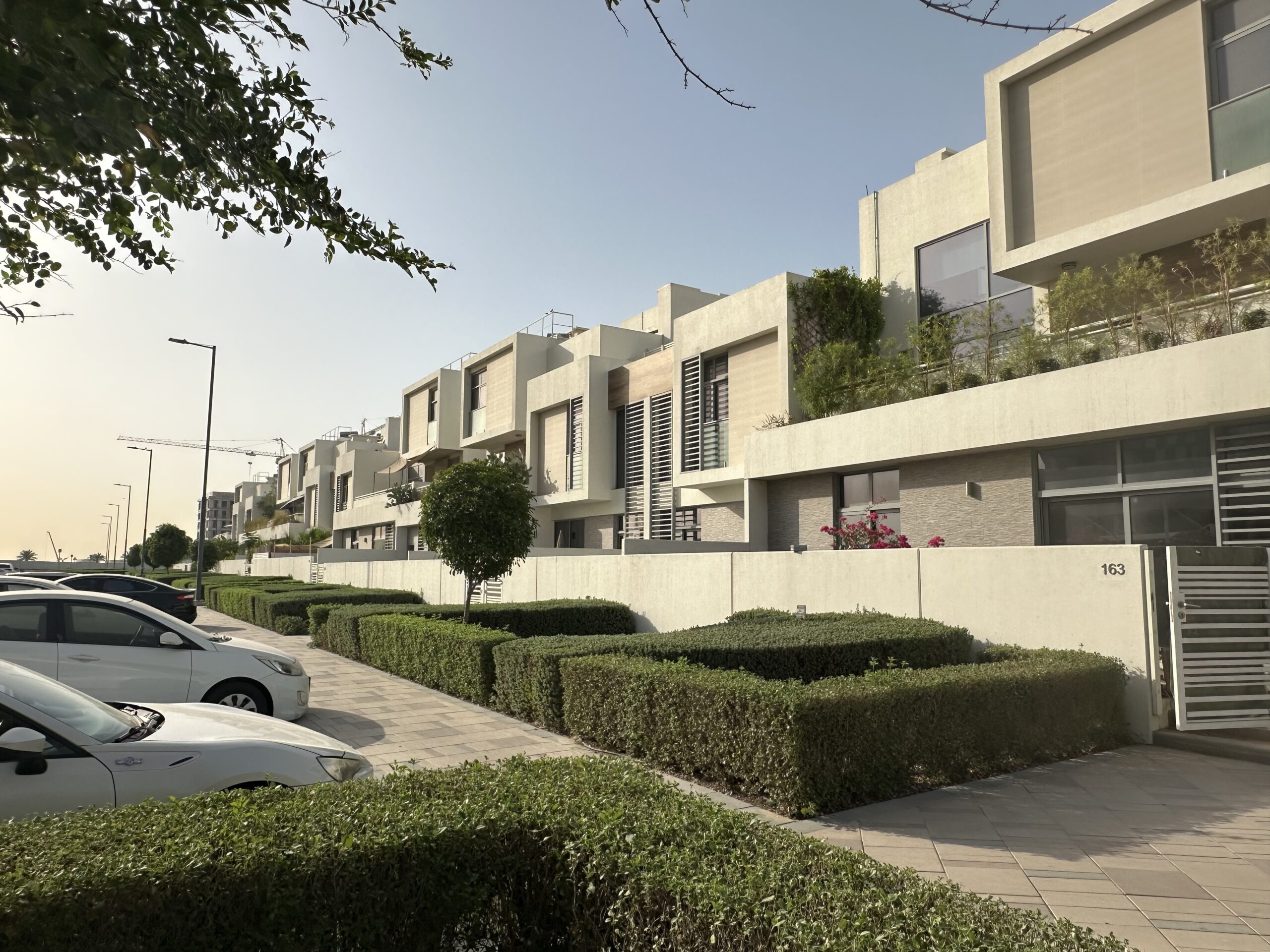 Contemporary Parklane Townhouses in Dubai South with landscaped surroundings.